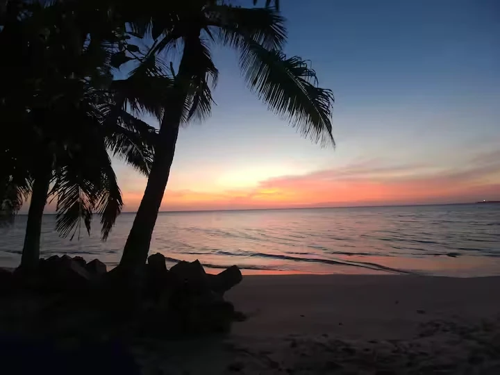 Sunset over the private beach at Baru Beach House